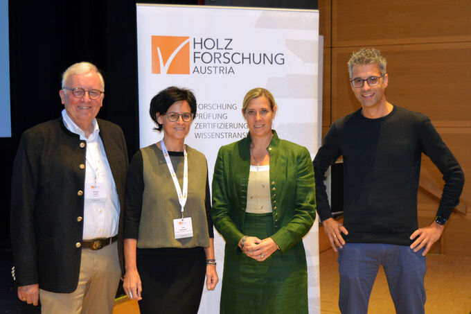 Winfried Heusler, Sonja Hohengasser, Sylvia Polleres and Dominik J. Philipp on stage.