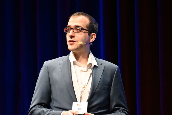 Roman Meixner on stage at the Fenster-Türen-Treff 2026.