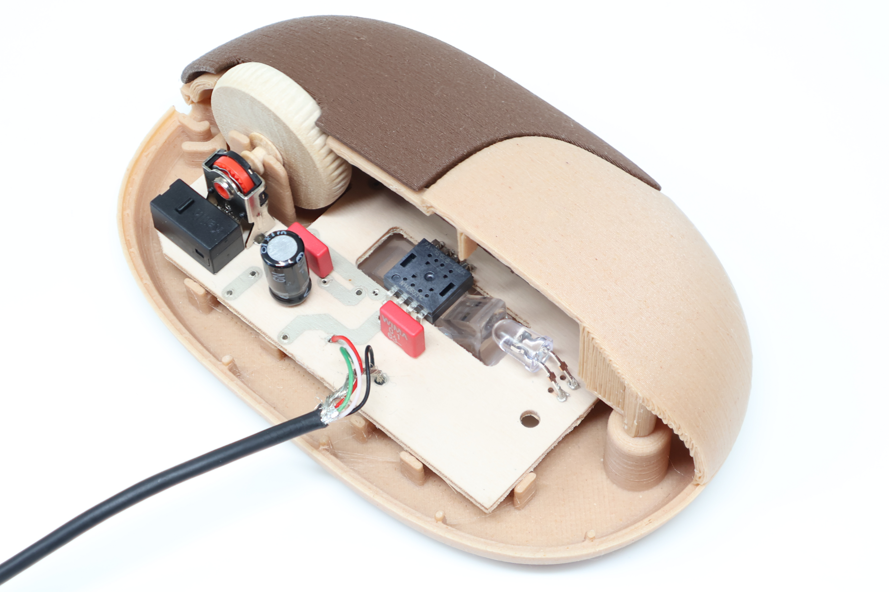 Computer mouse with a wooden circuit board