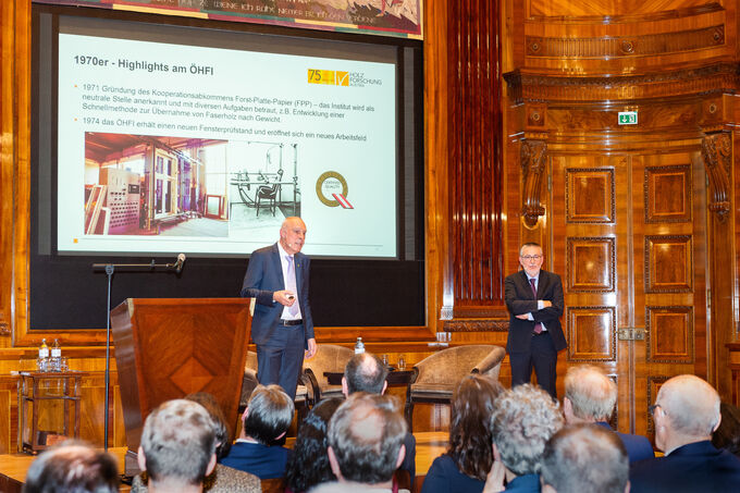 Manfred Brandstätter and Peter Schober during their presentation on the history of Holzforschung Austria.