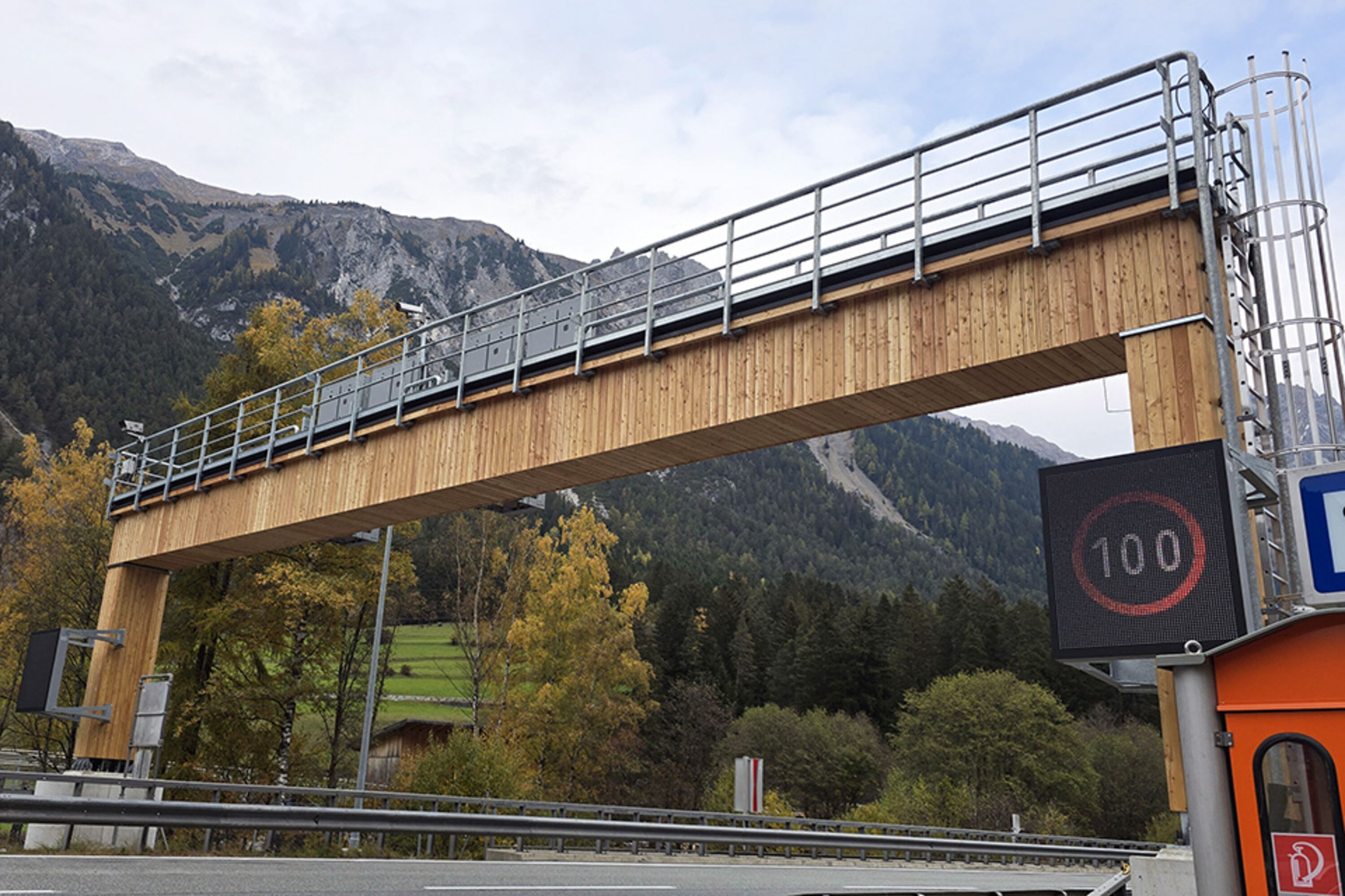 Overhead signpost made of wood